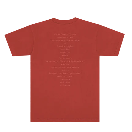 Celebrate the release of The Great American Bar Scene with the Bar Scene Rust Album Tee. This premium t-shirt is a tribute to Zach Bryan’s newest album, showcasing the vivid album artwork on the front with the album title embroidered above it. The back features the track list in a distinctive puff print.