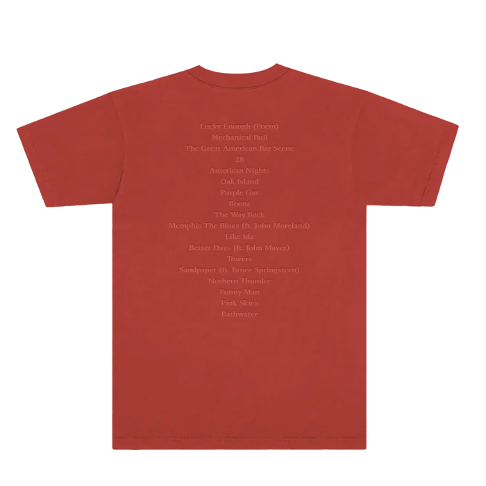 Celebrate the release of The Great American Bar Scene with the Bar Scene Rust Album Tee. This premium t-shirt is a tribute to Zach Bryan’s newest album, showcasing the vivid album artwork on the front with the album title embroidered above it. The back features the track list in a distinctive puff print.